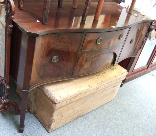 Appraisal: A Regency style mahogany serpentine sideboard cm wide