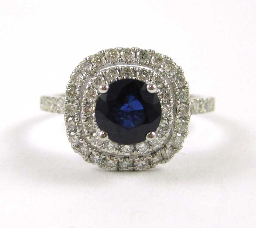 Appraisal: SAPPHIRE DIAMOND AND EIGHTEEN KARAT GOLD RING The white gold