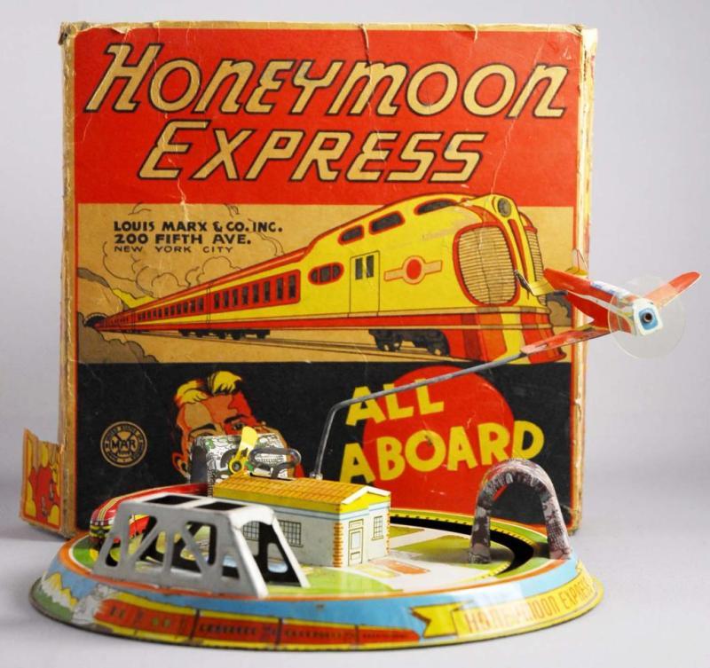 Appraisal: Marx Tin Wind-Up Honeymoon Express Toy Description Includes original box