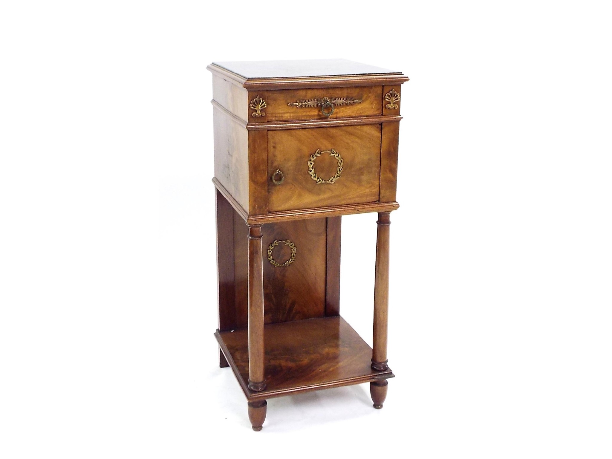 Appraisal: Attractive French Empire style flamed mahogany bedside pedestal cupboard with