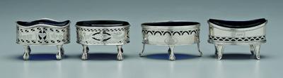 Appraisal: Four English silver salts oval with blue glass liners London