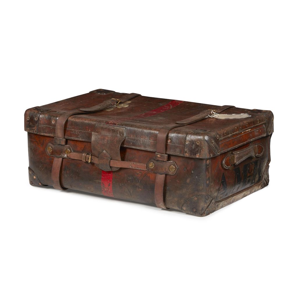 Appraisal: LEATHER TRAVELLING TRUNK EARLY TH CENTURY the interior fitted with