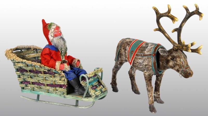 Appraisal: German Santa and Reindeer with Sleigh Description Circa s Both