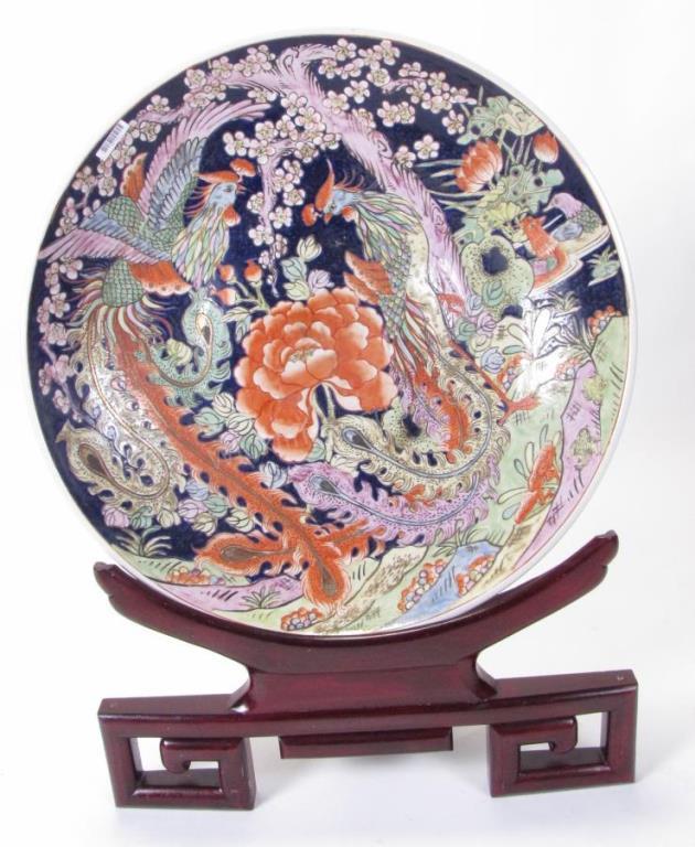 Appraisal: Monumental Oriental Porcelain Charger on Stand charger with phoenix and