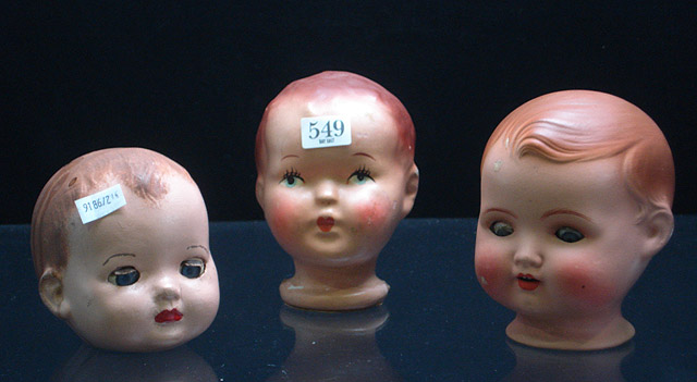 Appraisal: Three composition doll heads