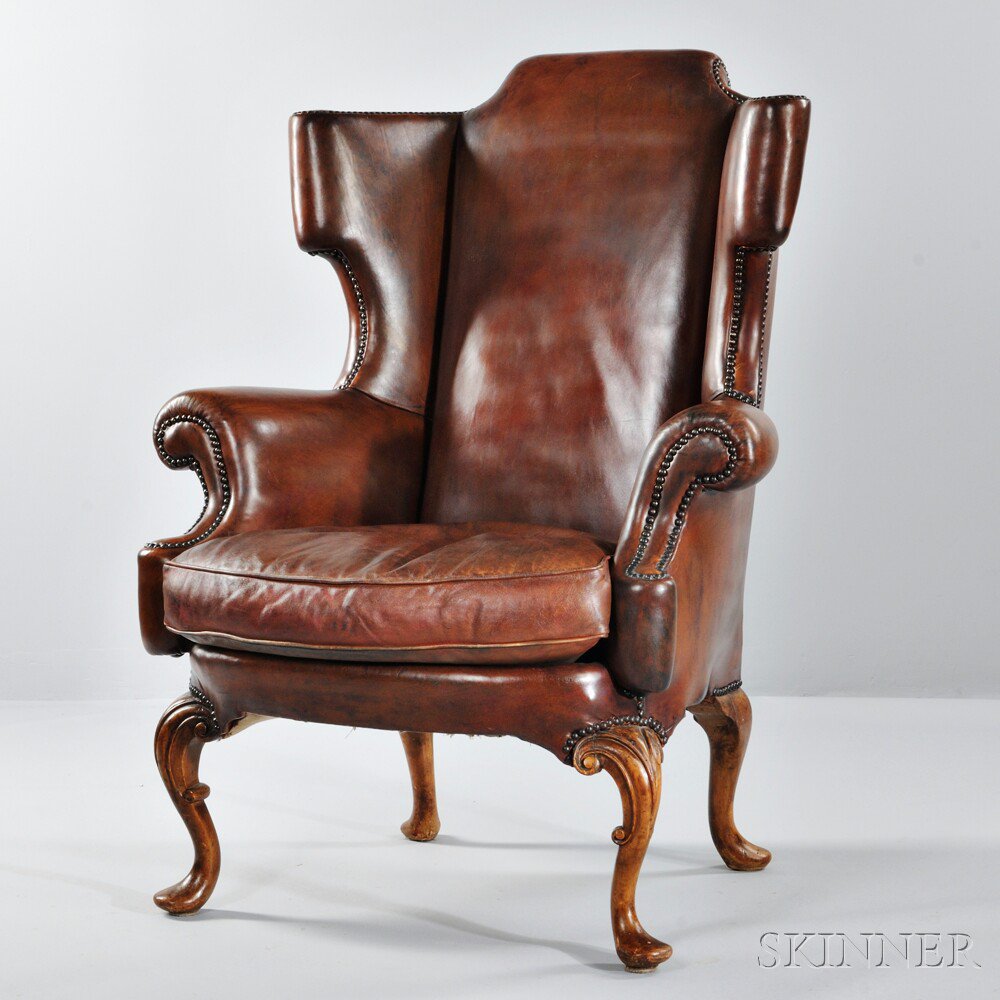 Appraisal: George III-style Leather Wing Chair early th century cognac-colored leather