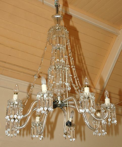 Appraisal: A CONTINENTAL CRYSTAL CHANDELIER The baluster stem with four tiers