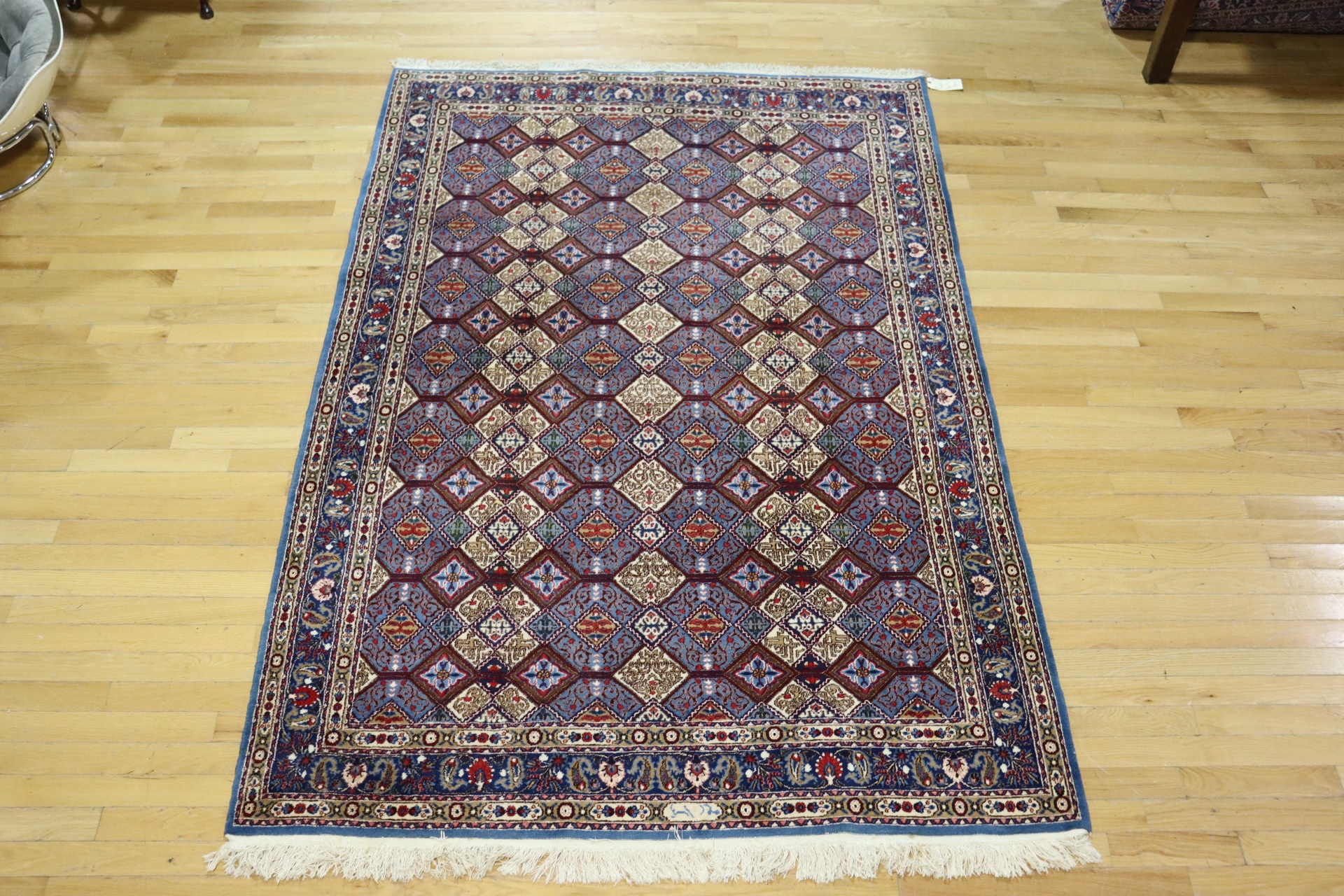 Appraisal: SIGNED VINTAGE FINELY HAND WOVEN TABRIZ CARPET Beautiful carpet with