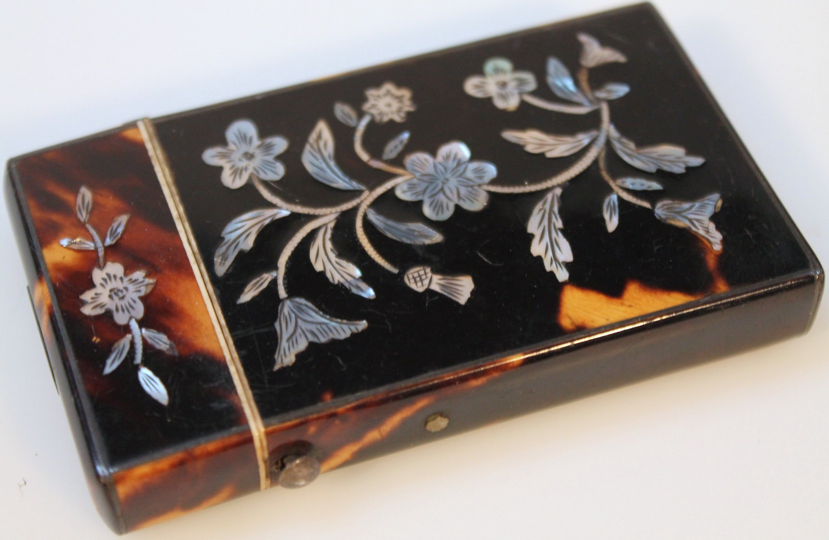 Appraisal: A Victorian tortoiseshell and mother of pearl card case the