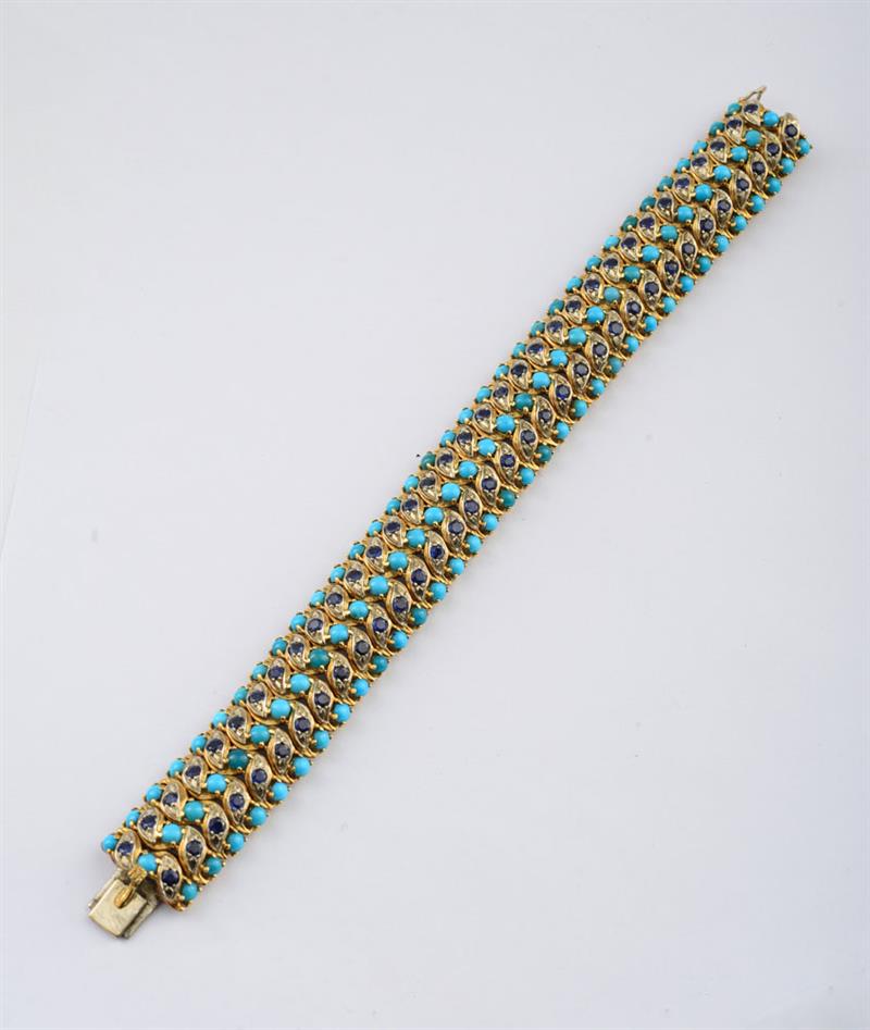 Appraisal: RETRO K GOLD TURQUOISE AND SAPPHIRE BRACELET Textured links set