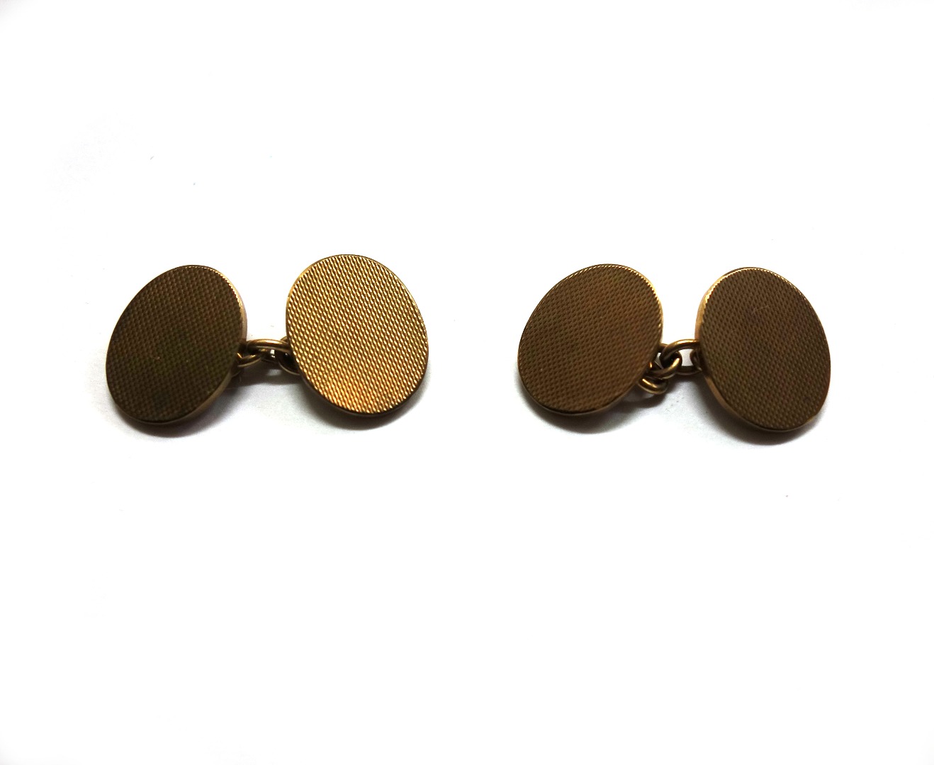 Appraisal: A pair of ct gold oval cufflinks each with two