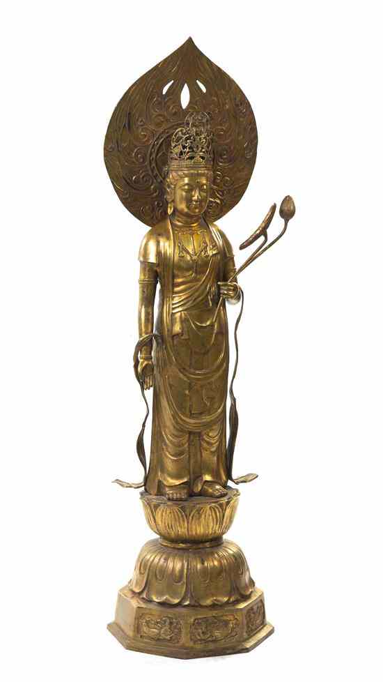 Appraisal: A Large Bronze Model of Guanyin the standing figure shown