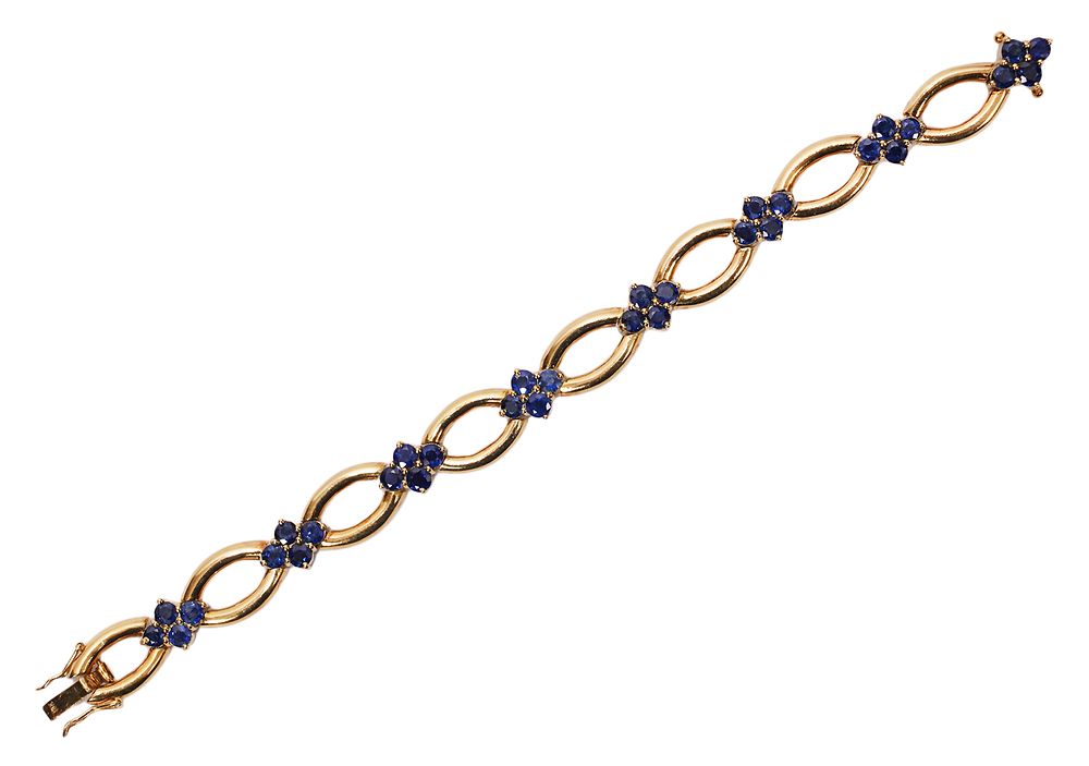 Appraisal: K Yellow Gold Blue Sapphire Bracelet K yellow gold open