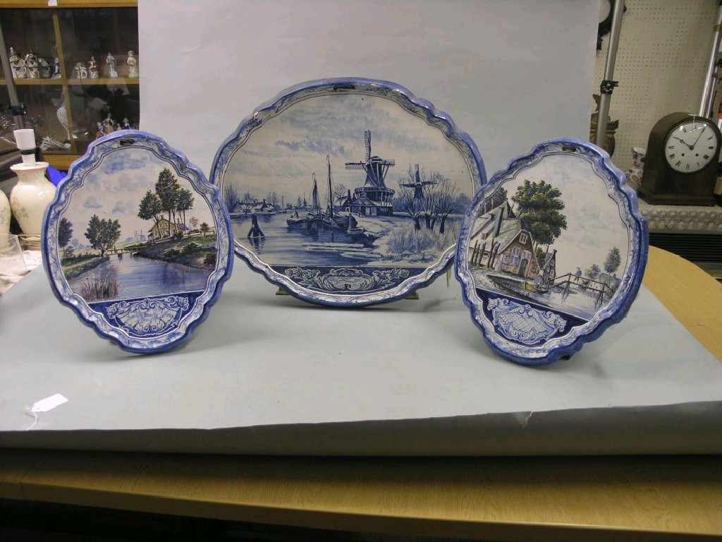 Appraisal: A group of three th century Dutch Delft plaques consisting