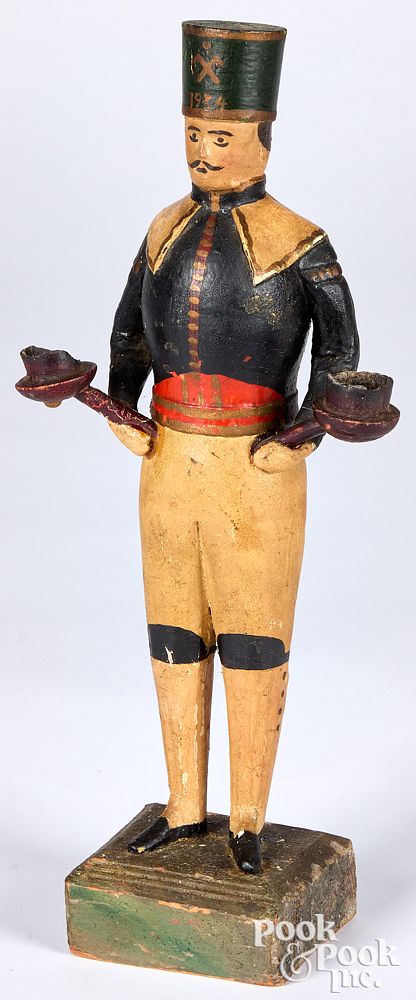 Appraisal: Carved and painted pine figure of a Carved and painted