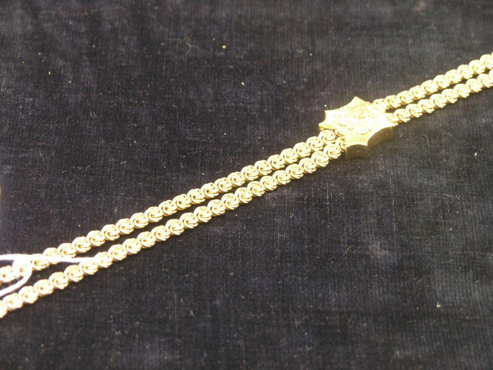 Appraisal: A foreign ct gold necklace the clasp with floral bouquet