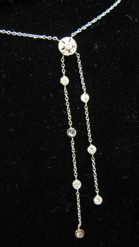 Appraisal: DIAMOND AND EIGHTEEN KARAT WHITE GOLD NECKLACE set with round