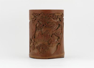 Appraisal: A Chinese bamboo brushpot carved with figures seated beneath pine