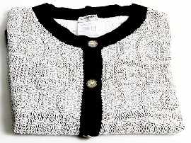 Appraisal: Chanel cashmere sequined cardigan in black and white Size Accompanied