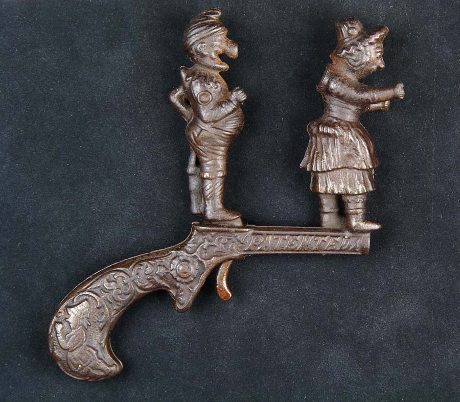 Appraisal: PUNCH JUDY ANIMATED TOY CAP PISTOL AN Manufactured by Ives