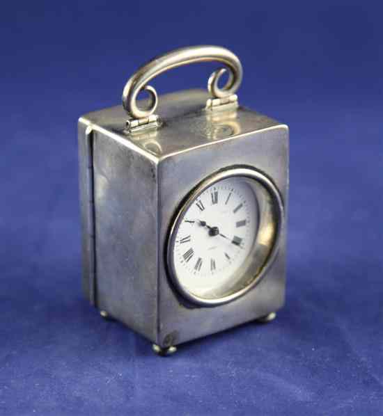 Appraisal: An Edwardian silver carriage timepiece by Mappin Webb with Roman