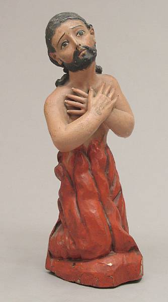 Appraisal: A Spanish Colonial polychrome carved wood figure of a saint