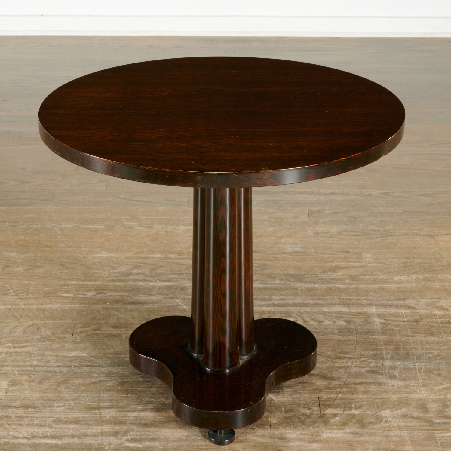 Appraisal: DUNBAR PEDESTAL OCCASIONAL TABLE c s American dark stained oak