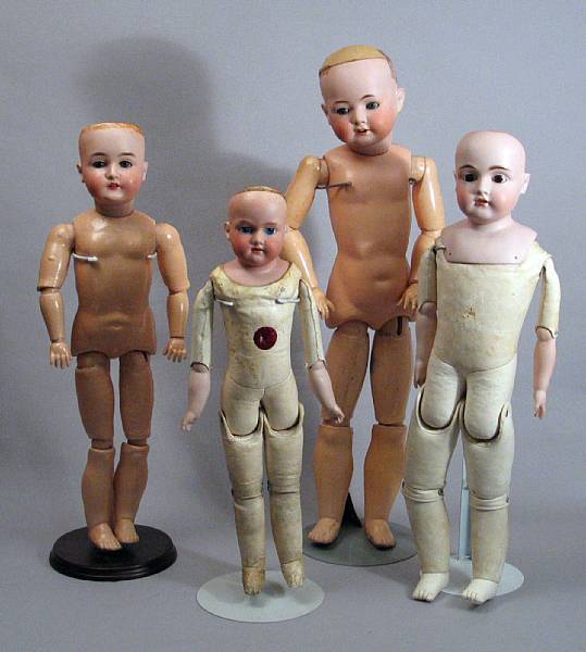 Appraisal: German Bisque-Headed Dolls An ensemble of four German dolls with