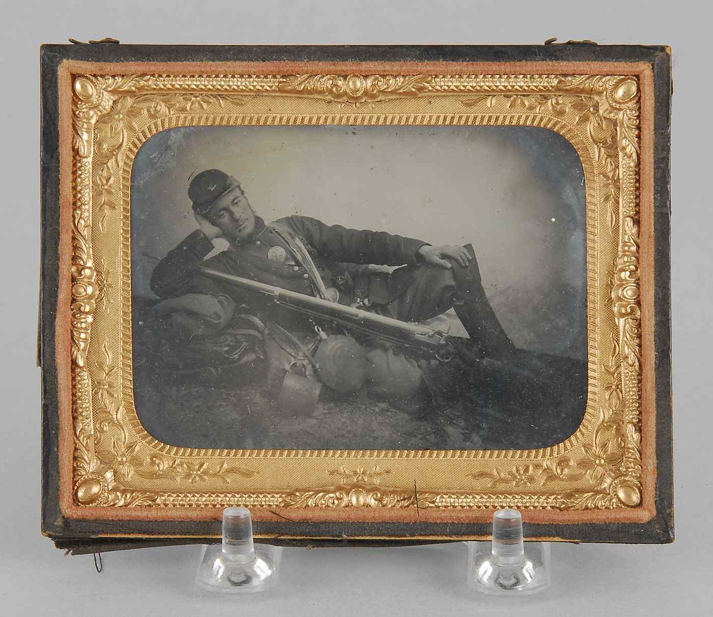 Appraisal: CASED AMBROTYPEDepicting a Civil War Union soldier in a recumbent