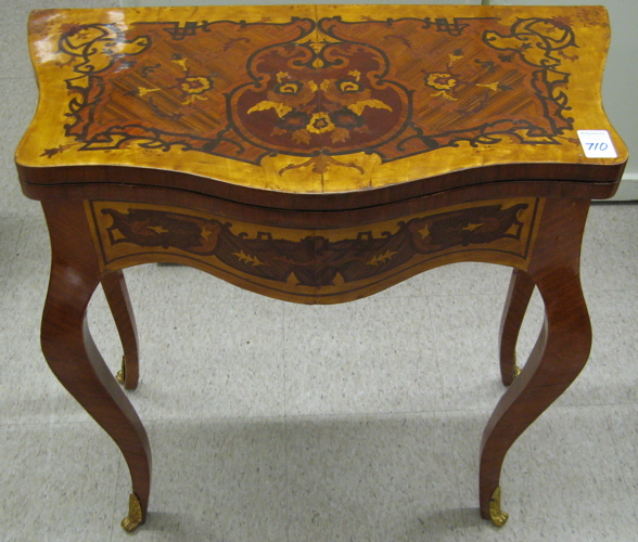 Appraisal: LOUIS XV STYLE MARQUETRY INLAID GAME TABLE the inlaid top