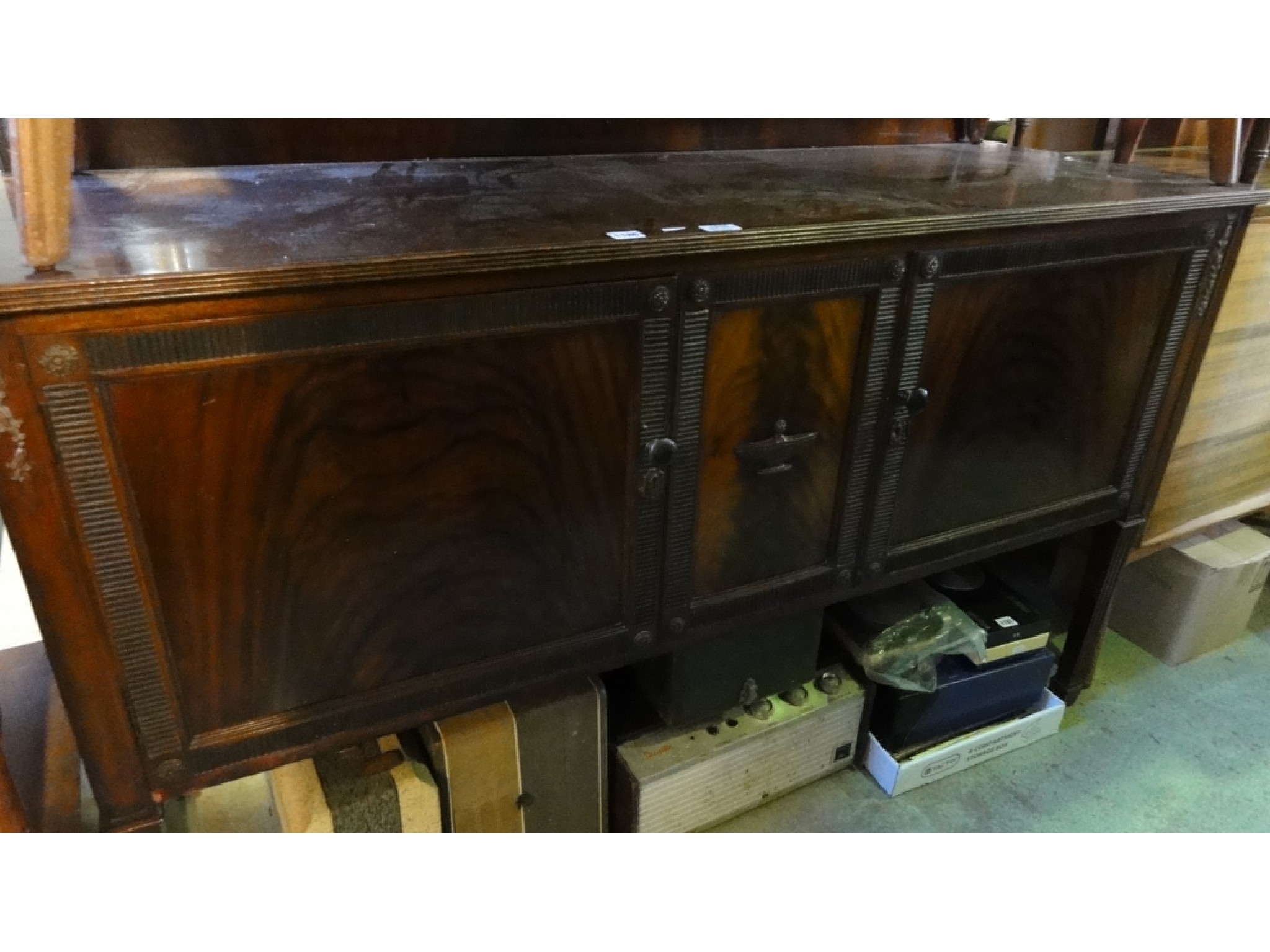 Appraisal: An Edwardian mahogany sideboard in the Georgian style with raised