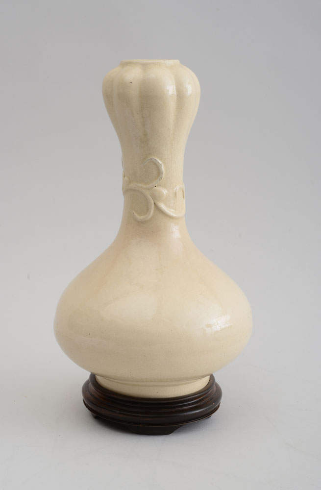 Appraisal: CHINESE MING TYPE IVORY GLAZED AND RELIEF DECORATED PORCELAIN GOURD-FORM