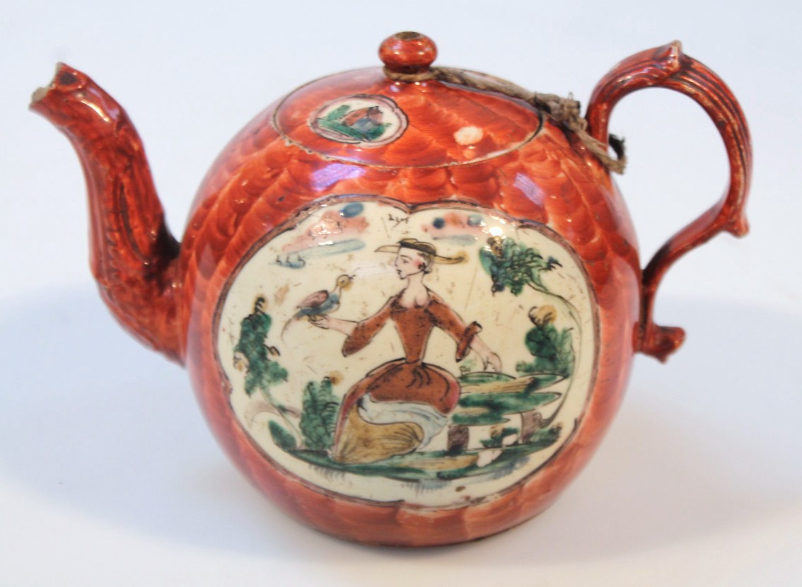 Appraisal: A mid- thC Staffordshire Creamware teapot the bulbous body hand