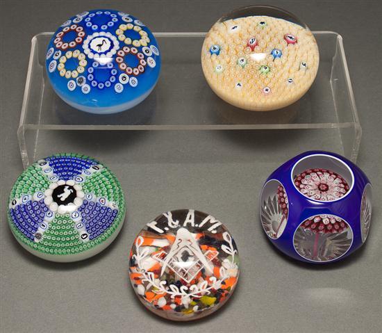 Appraisal: Four Baccarat millefiori glass paperweights and an American glass Masonic-themed