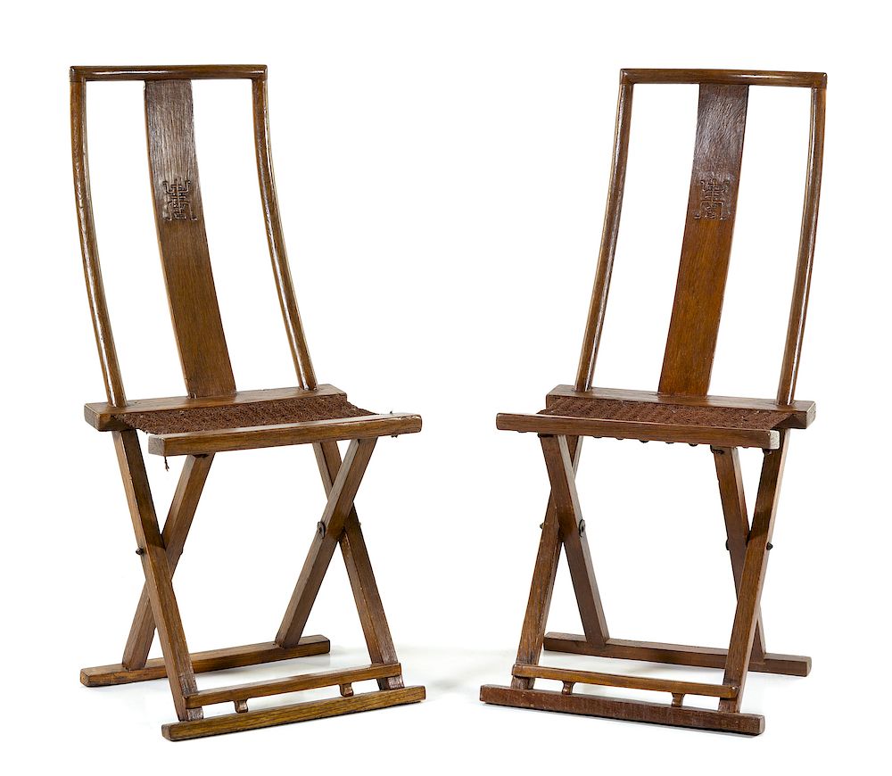 Appraisal: A Pair of Chinese Nanmu Folding Chairs Height x length