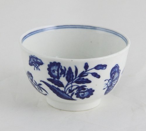 Appraisal: A Dr Wall tea bowl decorated flowers butterflies and insects