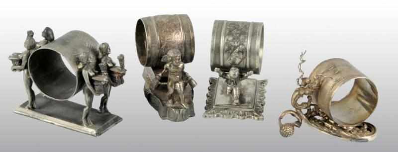 Appraisal: Lot of Figural Napkin Rings Description Includes No one cherub