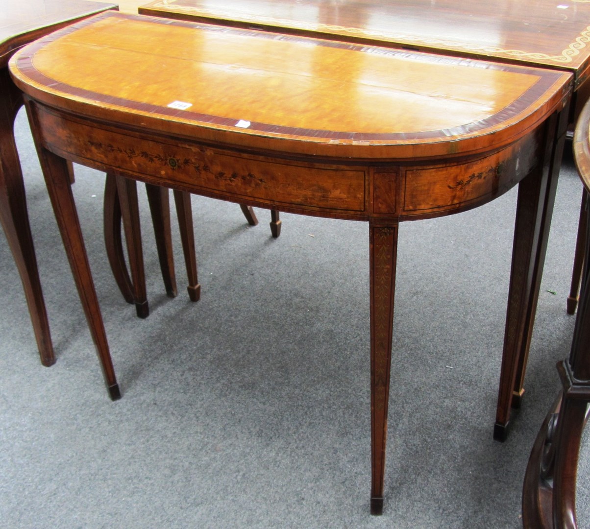 Appraisal: A George III marquetry inlaid mahogany banded satinwood card table