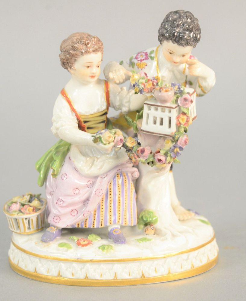 Appraisal: Meissen boy and girl with birdcage stamped to base marked