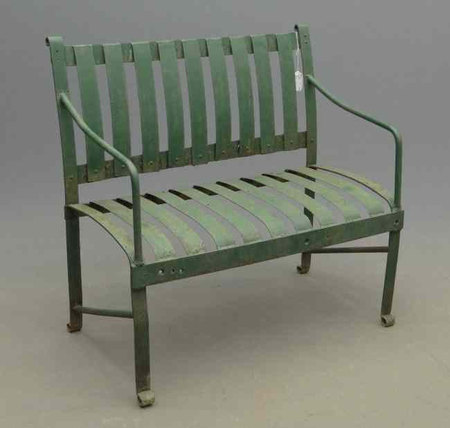 Appraisal: Early outdoor strap iron bench in green paint '' W