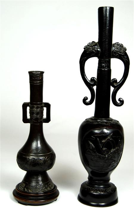 Appraisal: A th th century Chinese bronze vase with elongated cylindrical