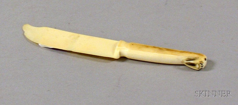 Appraisal: Inuit Carved Ivory Letter Opener with carved walrus head on