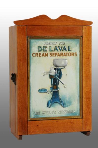 Appraisal: Wooden De Laval Cream Separators Cabinet Description Has embossed tin