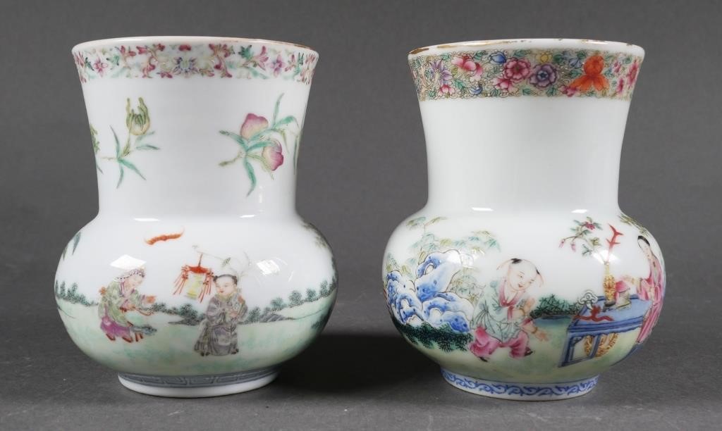 Appraisal: Pair of small Chinese ceramic vases with figures in a