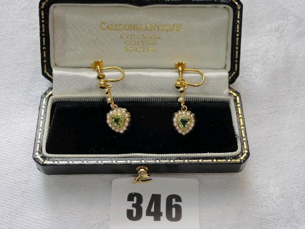 Appraisal: A pair of ct gold earrings with peridot and pearl