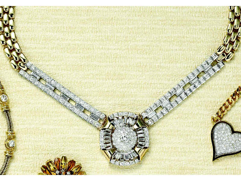 Appraisal: DIAMOND MEDALLION NECKLACE Yellow gold and platinum medallion set with