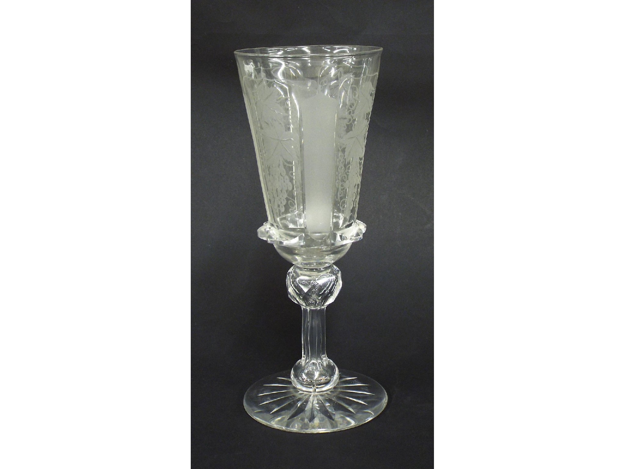 Appraisal: Victorian glass goblet the tapered bowl engraved with fruiting vines