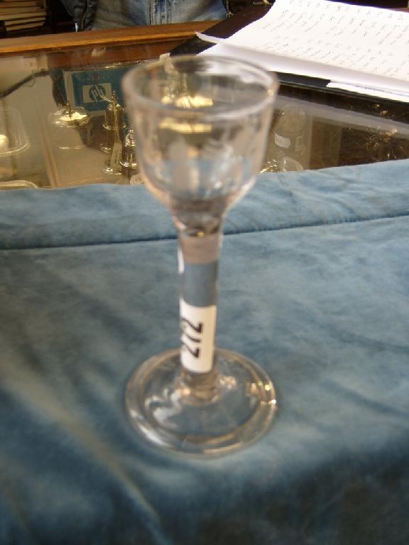 Appraisal: An th century drinking glass with etched rose and flying