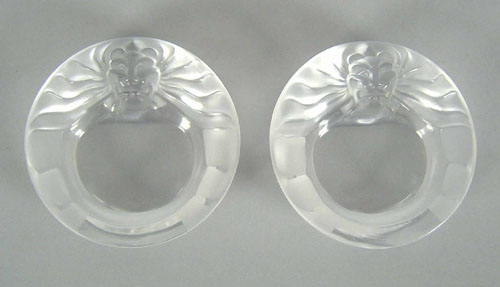 Appraisal: Pair Lalique lions mask ashtrays dia