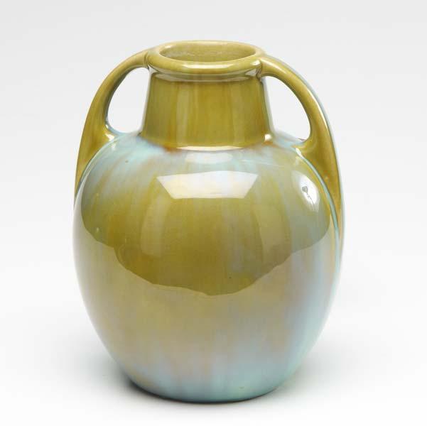 Appraisal: FULPER Bulbous two-handled vase covered in turquoise and amber glaze